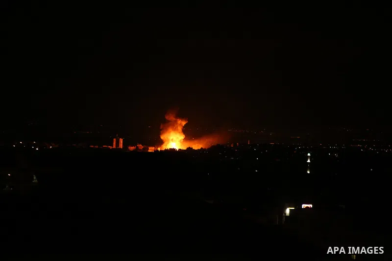 A picture taken on on October 27, 2018 shows a fireball exploding during Israeli air strikes in Gaza City. Photo by Dawoud Abo Alkas