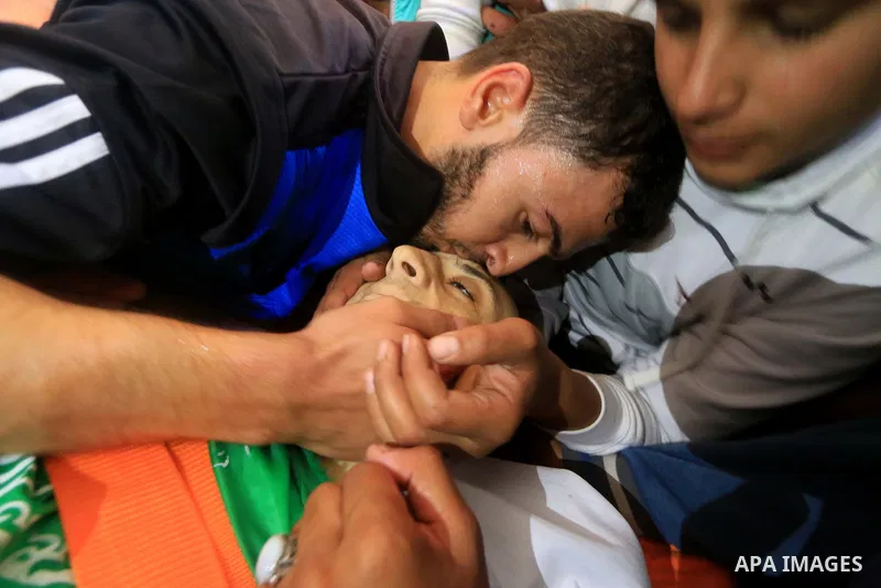 Relatives of Palestinian Mujahid Aql, 24, who was died of his wounds which he sustained by Israeli forces during clashes in tents protest where Palestinians demand the right to return to their homeland at the Israel-Gaza...