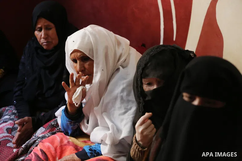 Relatives of Palestinian teenager Khaled Saed, who was killed in an Israeli air strike on the Gaza Strip , mourn during his funeral in Deir el-Balah in central of the Gaza Strip on October 29, 2018. Photo by Ashraf Amra