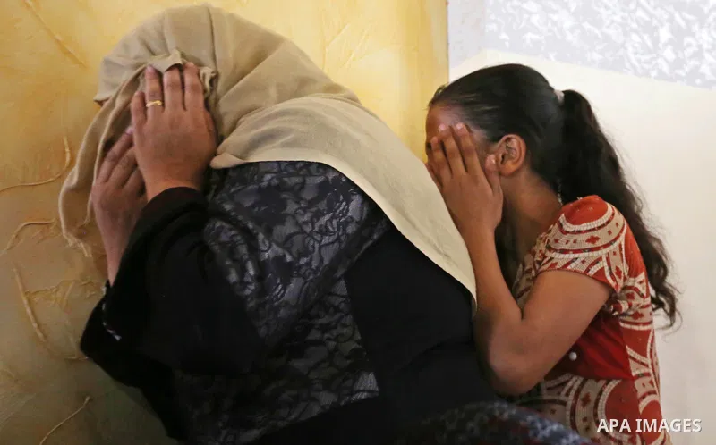 Relatives of Palestinian teenager Khaled Saed, who was killed in an Israeli air strike on the Gaza Strip , mourn during his funeral in Deir el-Balah in central of the Gaza Strip on October 29, 2018. Photo by Ashraf Amra