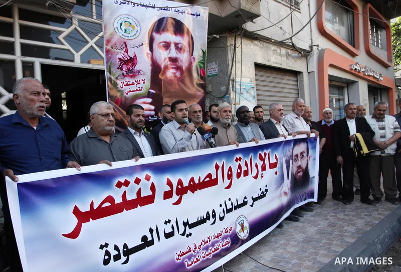 Palestinians take part during a protest to show solidarity with Islamic Jihad member Khader Adnan, after he break his hunger strike at Israeli jails, in Gaza City on October 29, 2018. Photo by Mahmoud Ajjour
