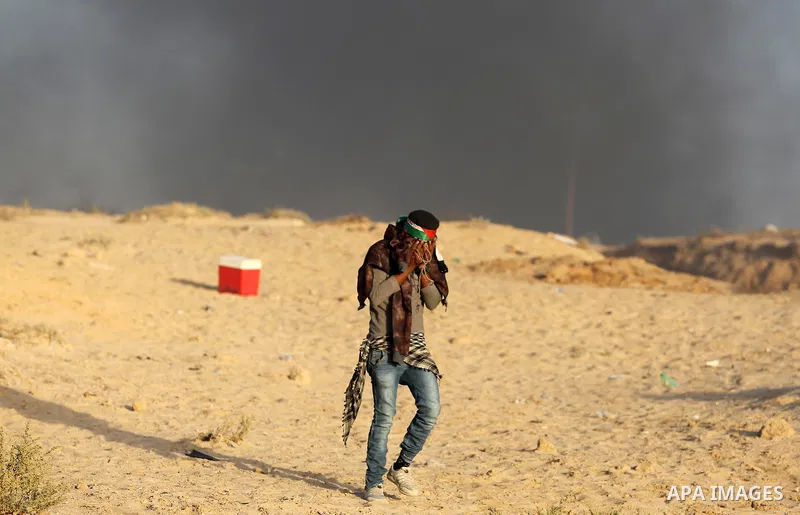 Palestinian protesters gather during clashes with Israeli forces in a demonstration against the Israeli blockade on Gaza Strip, along the Gaza sea barrier on the maritime border with Israel near Kibbutz Zikim, north of B...