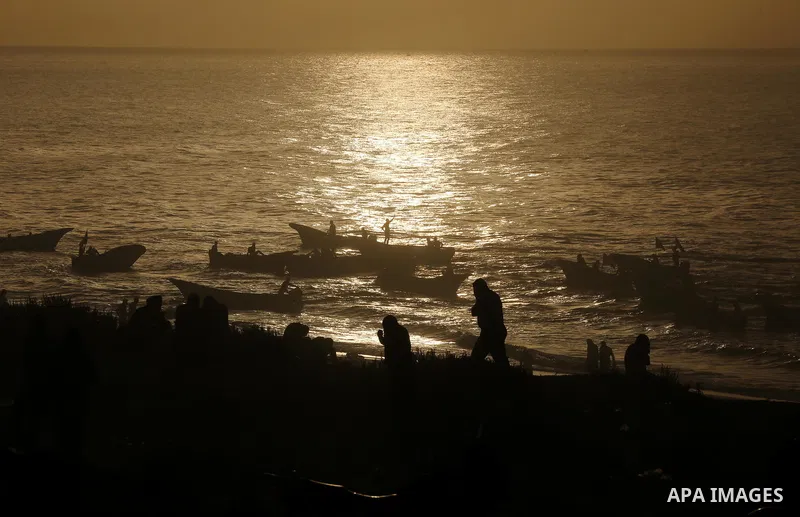 Palestinian protesters sail with boats during a demonstration against the Israeli blockade on Gaza Strip, along the Gaza sea barrier on the maritime border with Israel near Kibbutz Zikim, north of Beit Lahia in the north...