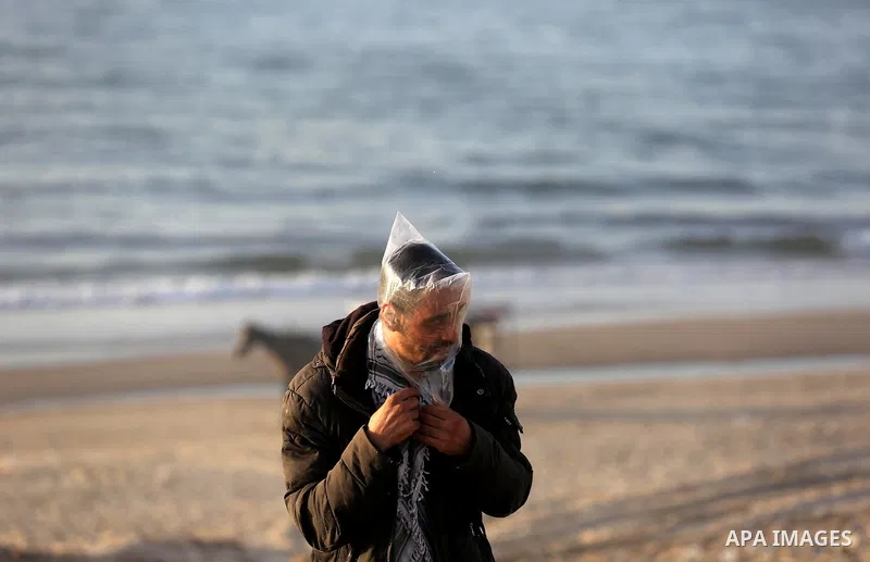 Palestinian protesters gather during clashes with Israeli forces in a demonstration against the Israeli blockade on Gaza Strip, along the Gaza sea barrier on the maritime border with Israel near Kibbutz Zikim, north of B...
