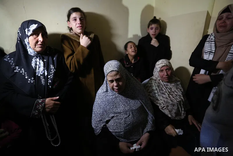 Relatives of Palestinian Mohammed abu Abada, 27, who was shot dead by Israeli forces during a demonstration against the Israeli blockade on Gaza Strip, along the Gaza sea barrier on the maritime border with Israel near K...