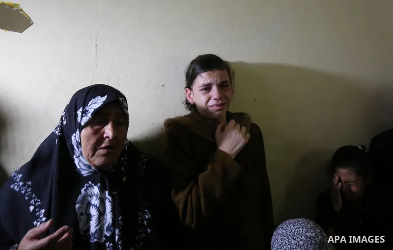 Relatives of Palestinian Mohammed abu Abada, 27, who was shot dead by Israeli forces during a demonstration against the Israeli blockade on Gaza Strip, along the Gaza sea barrier on the maritime border with Israel near K...