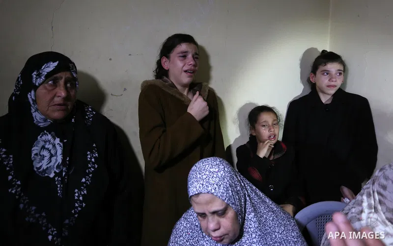 Relatives of Palestinian Mohammed abu Abada, 27, who was shot dead by Israeli forces during a demonstration against the Israeli blockade on Gaza Strip, along the Gaza sea barrier on the maritime border with Israel near K...