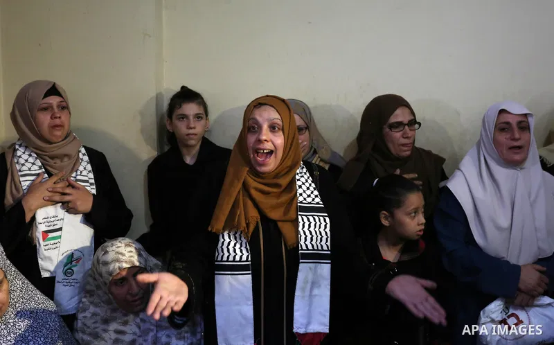 Relatives of Palestinian Mohammed abu Abada, 27, who was shot dead by Israeli forces during a demonstration against the Israeli blockade on Gaza Strip, along the Gaza sea barrier on the maritime border with Israel near K...