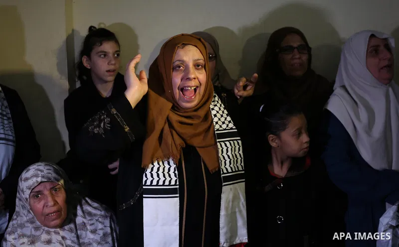 Relatives of Palestinian Mohammed abu Abada, 27, who was shot dead by Israeli forces during a demonstration against the Israeli blockade on Gaza Strip, along the Gaza sea barrier on the maritime border with Israel near K...