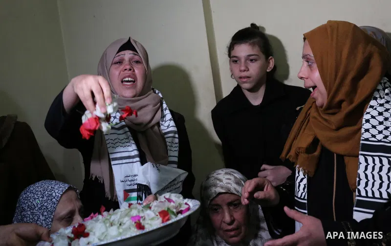 Relatives of Palestinian Mohammed abu Abada, 27, who was shot dead by Israeli forces during a demonstration against the Israeli blockade on Gaza Strip, along the Gaza sea barrier on the maritime border with Israel near K...