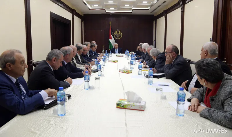Palestinian President Mahmoud Abbas chairs a meeting of the Higher National Committee in the West Bank city of Ramallah on October 30, 2018. Photo by Thaer Ganaim