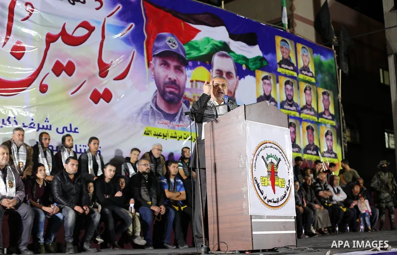 Senior Hamas leader Ismail Radwan, speaks during a memorial service for Islamic Jihad militants who were killed in an Israeli operation to blow up a tunnel last year, at the Bureij refugee camp, in central Gaza Strip, on...