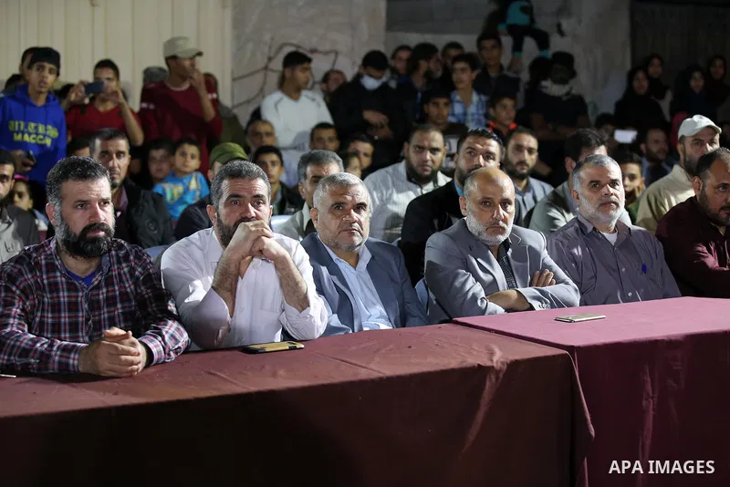 Palestinian supporters of Islamic Jihad movement attends a memorial service for Islamic Jihad militants who were killed in an Israeli operation to blow up a tunnel last year, at the Bureij refugee camp, in central Gaza S...