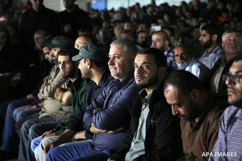 Palestinian supporters of Islamic Jihad movement attends a memorial service for Islamic Jihad militants who were killed in an Israeli operation to blow up a tunnel last year, at the Bureij refugee camp, in central Gaza S...