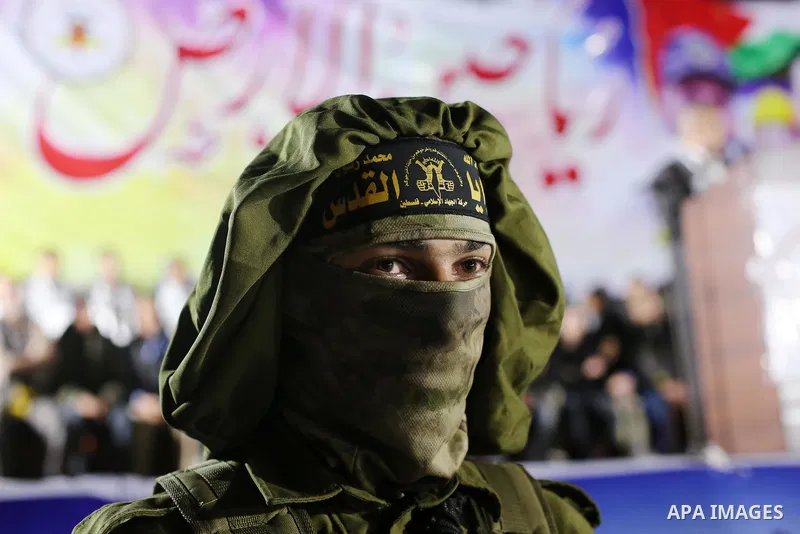 Palestinian Islamic Jihad militants take part during a memorial service for Islamic Jihad militants who were killed in an Israeli operation to blow up a tunnel last year, at the Bureij refugee camp, in central Gaza Strip...
