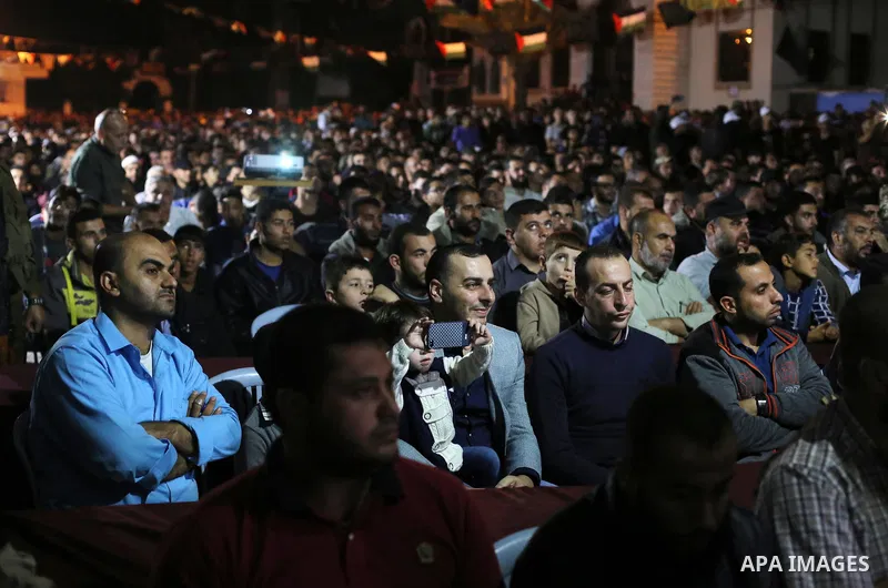 Palestinian supporters of Islamic Jihad movement attends a memorial service for Islamic Jihad militants who were killed in an Israeli operation to blow up a tunnel last year, at the Bureij refugee camp, in central Gaza S...