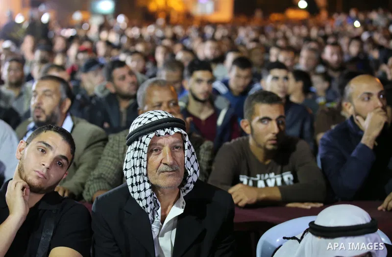 Palestinian supporters of Islamic Jihad movement attends a memorial service for Islamic Jihad militants who were killed in an Israeli operation to blow up a tunnel last year, at the Bureij refugee camp, in central Gaza S...