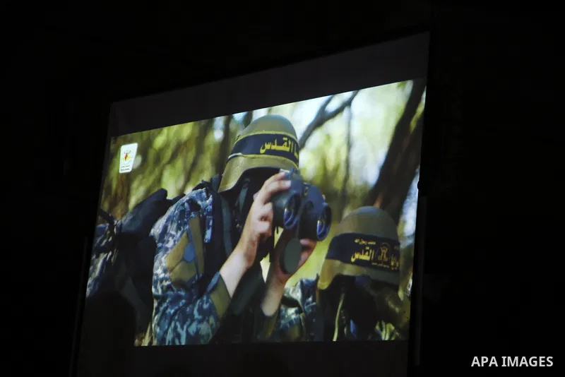 Palestinian supporters of Islamic Jihad movement attends a memorial service for Islamic Jihad militants who were killed in an Israeli operation to blow up a tunnel last year, at the Bureij refugee camp, in central Gaza S...