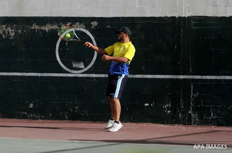 Palestinian tennis's players participate during doubles match at a local tennis championship, in Gaza City on October 31, 2018. Photo by Mahmoud Ajjour