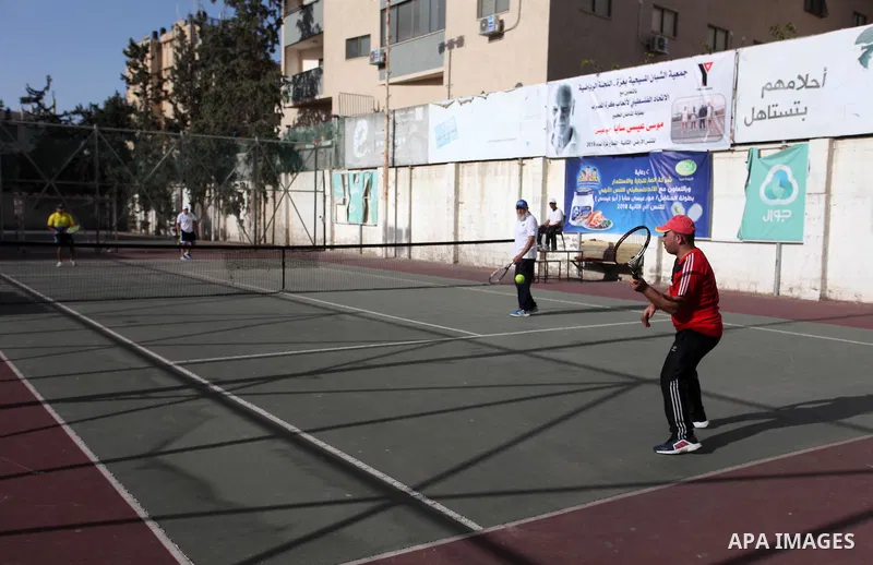 Palestinian tennis's players participate during doubles match at a local tennis championship, in Gaza City on October 31, 2018. Photo by Mahmoud Ajjour