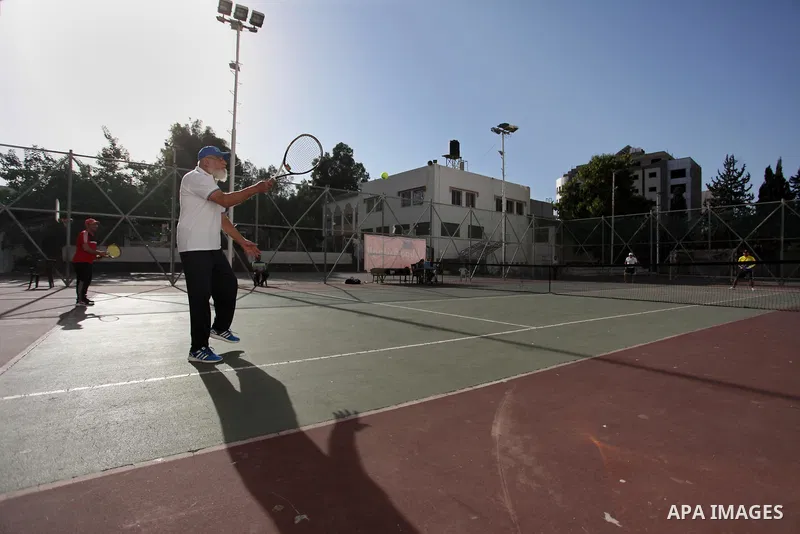 Palestinian tennis's players participate during doubles match at a local tennis championship, in Gaza City on October 31, 2018. Photo by Mahmoud Ajjour