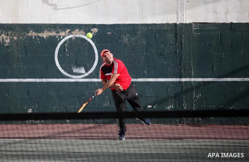 Palestinian tennis's players participate during doubles match at a local tennis championship, in Gaza City on October 31, 2018. Photo by Mahmoud Ajjour