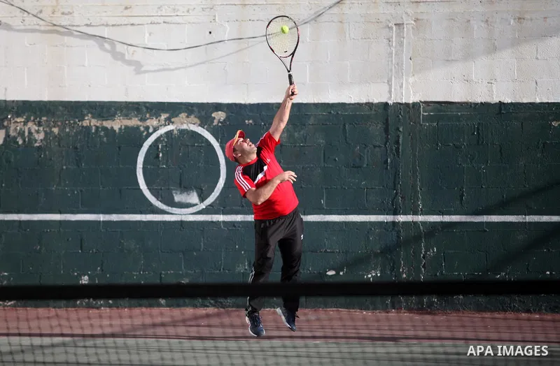 Palestinian tennis's players participate during doubles match at a local tennis championship, in Gaza City on October 31, 2018. Photo by Mahmoud Ajjour