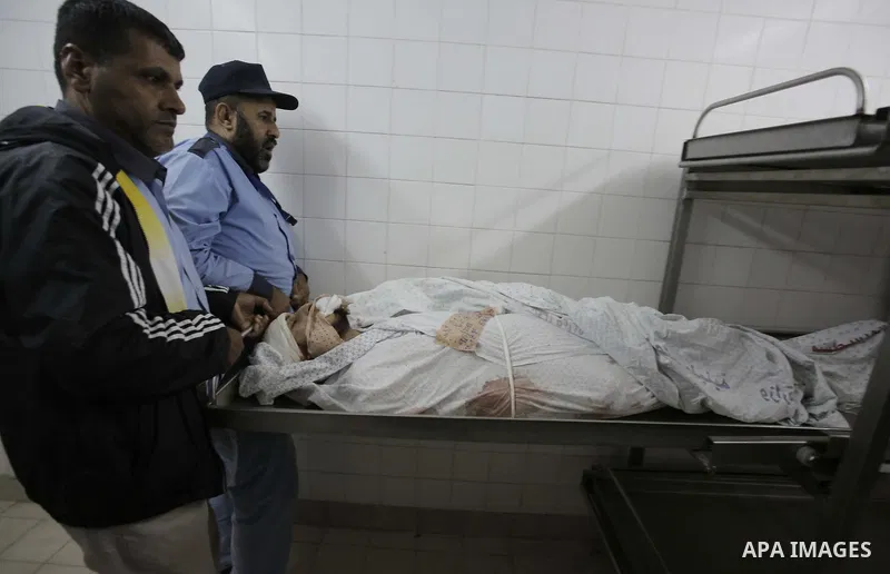 The body of Palestinian Mohammed Rami Qahman, 28, who was shot dead by Israeli forces at the Israel-Gaza border, at the morgue of the European Hospital in Khan Yunis in the southern Gaza Strip on November 9, 2018 Photo b...