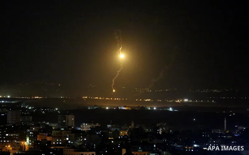 Flares fired by Israeli forces are seen over the Israel-Gaza border, after Israeli air targeting Gaza City on November 12, 2018. Israel's military said it was carrying out air strikes "throughout the Gaza Strip" after a...