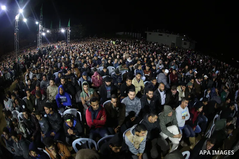 Palestinians attend a memorial service for seven members of Ezzedine al-Qassam Brigades, the armed wing of the Palestinian Hamas movement who were killed during an Israeli special forces operation in the Gaza Strip last...