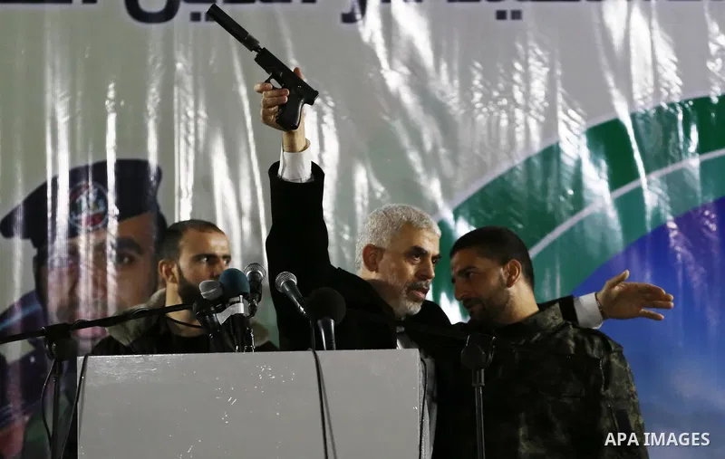Hamas's leader in the Gaza Strip Yahya Sinwar attends a memorial service for seven members of Ezzedine al-Qassam Brigades, the armed wing of the Palestinian Hamas movement who were killed during an Israeli special forces...