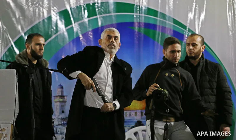 Hamas's leader in the Gaza Strip Yahya Sinwar attends a memorial service for seven members of Ezzedine al-Qassam Brigades, the armed wing of the Palestinian Hamas movement who were killed during an Israeli special forces...