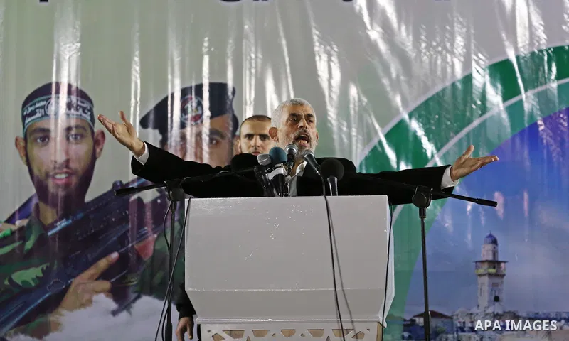 Hamas's leader in the Gaza Strip Yahya Sinwar speaks during a memorial service for seven members of Ezzedine al-Qassam Brigades, the armed wing of the Palestinian Hamas movement who were killed during an Israeli special...