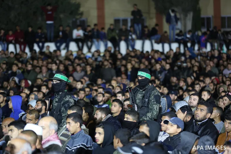 Palestinians attend a memorial service for seven members of Ezzedine al-Qassam Brigades, the armed wing of the Palestinian Hamas movement who were killed during an Israeli special forces operation in the Gaza Strip last...
