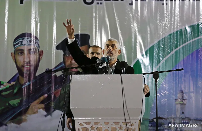 Hamas's leader in the Gaza Strip Yahya Sinwar speaks during a memorial service for seven members of Ezzedine al-Qassam Brigades, the armed wing of the Palestinian Hamas movement who were killed during an Israeli special...