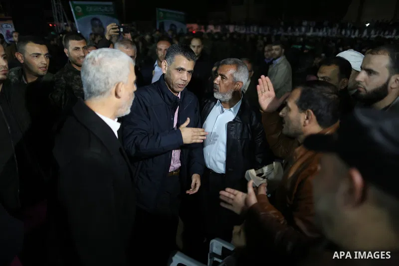 Charge of Palestinian affairs files in the Egyptian Intelligence, Ahmed Abdel khaleq attends a memorial service for seven members of Ezzedine al-Qassam Brigades, the armed wing of the Palestinian Hamas movement who were...