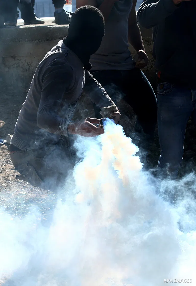 Palestinian protesters clash with Israeli forces after prevent Palestinian farmers to reach to their lands and planting olive trees, in the West Bank village of Urif, near Nablus on November 17, 2018. Photo by Shadi Jara...
