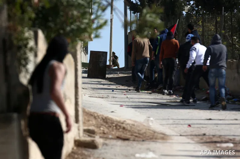 Palestinian protesters clash with Israeli forces after prevent Palestinian farmers to reach to their lands and planting olive trees, in the West Bank village of Urif, near Nablus on November 17, 2018. Photo by Shadi Jara...