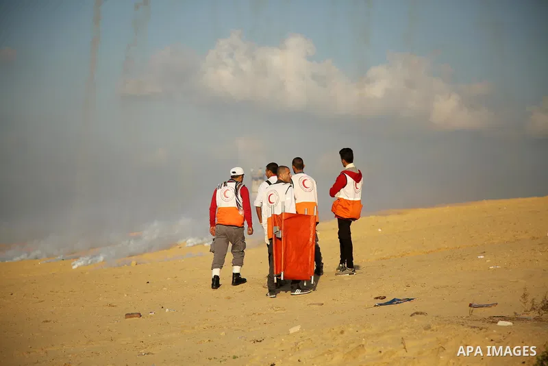 Palestinian protesters gather during clashes with Israeli forces in a demonstration against the Israeli blockade on Gaza Strip, along the Gaza sea barrier on the maritime border with Israel near Kibbutz Zikim, north of B...
