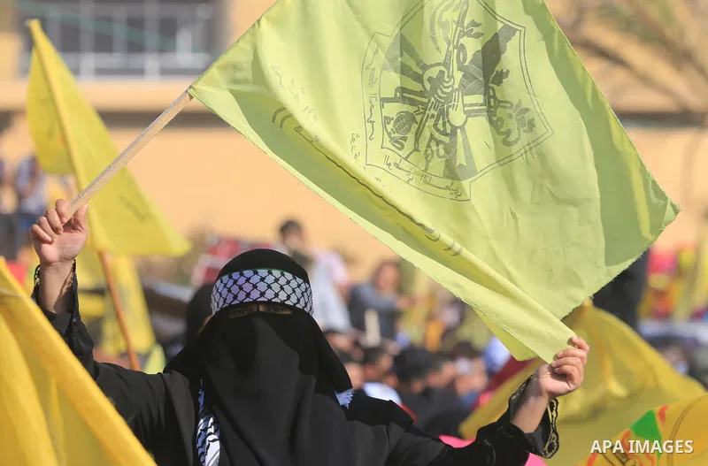 Palestinian Fatah supporters take part in a rally to mark the 14th anniversary of the death of late Palestinian leader Yasser Arafat in Gaza City on November 20, 2018. Photo by Mahmoud Khattab
