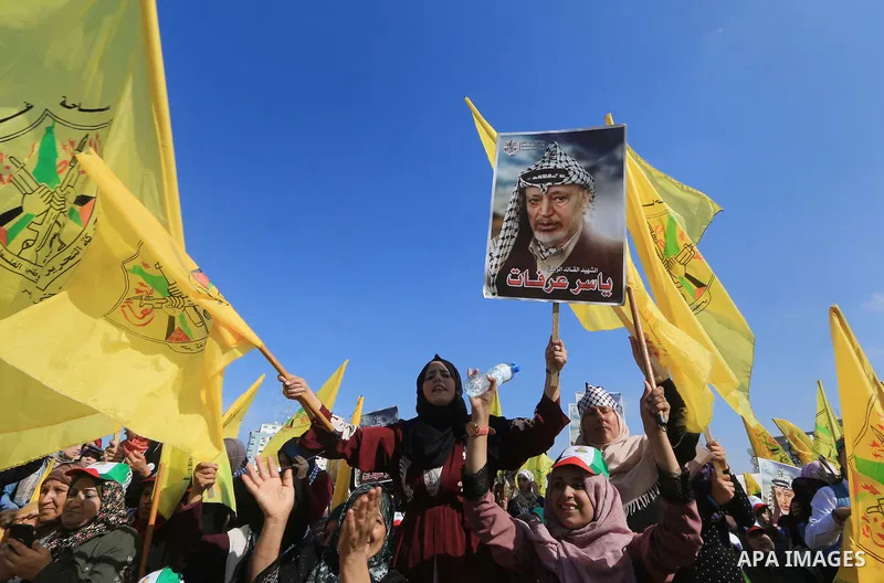 Palestinian Fatah supporters take part in a rally to mark the 14th anniversary of the death of late Palestinian leader Yasser Arafat in Gaza City on November 20, 2018. Photo by Mahmoud Khattab