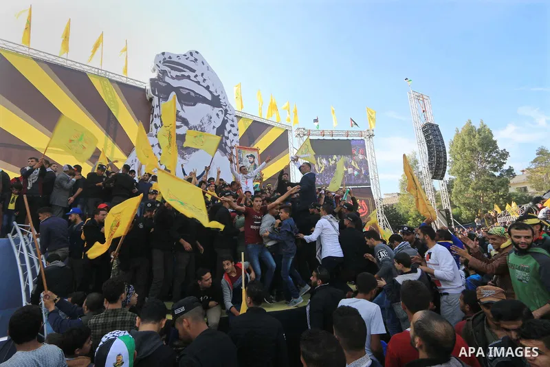 Palestinian Fatah supporters take part in a rally to mark the 14th anniversary of the death of late Palestinian leader Yasser Arafat in Gaza City on November 20, 2018. Photo by Mahmoud Khattab