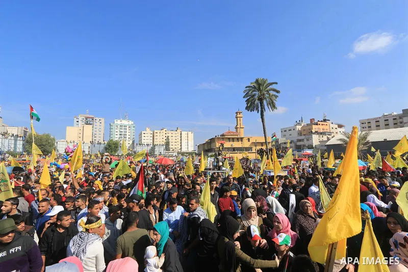 Palestinian Fatah supporters take part in a rally to mark the 14th anniversary of the death of late Palestinian leader Yasser Arafat in Gaza City on November 20, 2018. Photo by Mahmoud Khattab