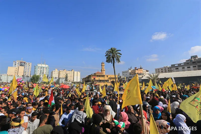 Palestinian Fatah supporters take part in a rally to mark the 14th anniversary of the death of late Palestinian leader Yasser Arafat in Gaza City on November 20, 2018. Photo by Mahmoud Khattab
