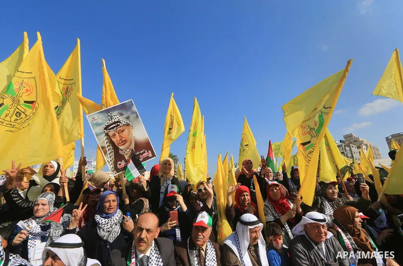 Palestinian Fatah supporters take part in a rally to mark the 14th anniversary of the death of late Palestinian leader Yasser Arafat in Gaza City on November 20, 2018. Photo by Mahmoud Khattab