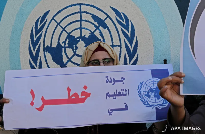 Palestinian employees of United Nations Relief and Works Agency (UNRWA) take part in a protest demanding their rights, outside its headquarter office, in Gaza City on November 25, 2018. Photo by Ashraf Amra