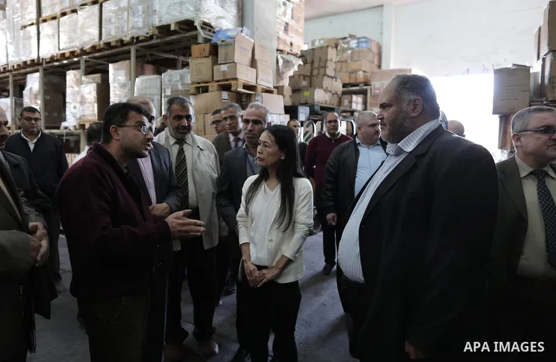 Palestinians attend a press conference for the Japanese ambassador on drugs provided by a grant from his government, in Gaza City on November 25, 2018. Photo by Ashraf Amra