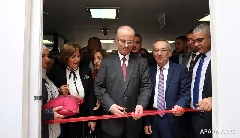 Palestinian Prime Minister, Rami Hamdallah, attends a ceremony honoring the national football team to participate in the Asian Cup, in the West Bank city of Nablus, on November 25, 2018. Photo by Prime Minister Office