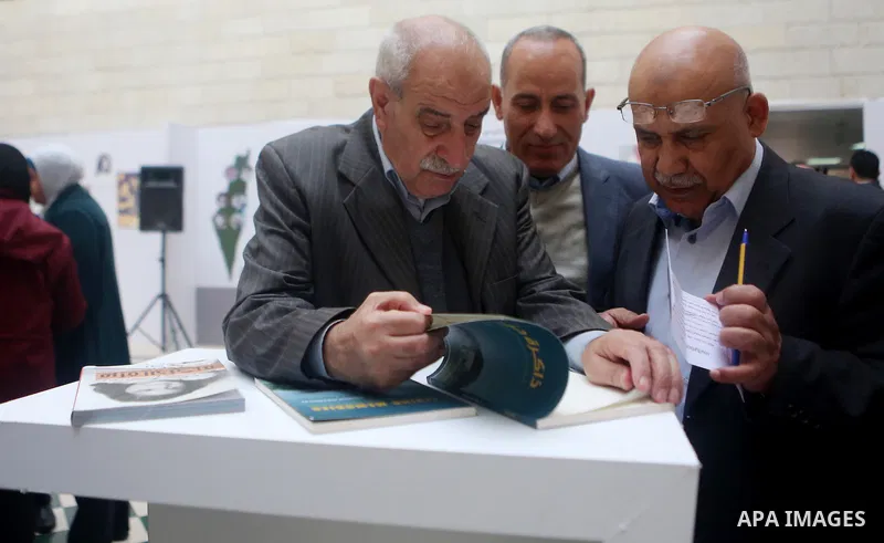 Palestinians attend an exhibition of life of Palestinians who were displaced in 1948 at an-Najah University in the West Bank city of Nablus on November 25, 2018. Photo by Shadi Hatem