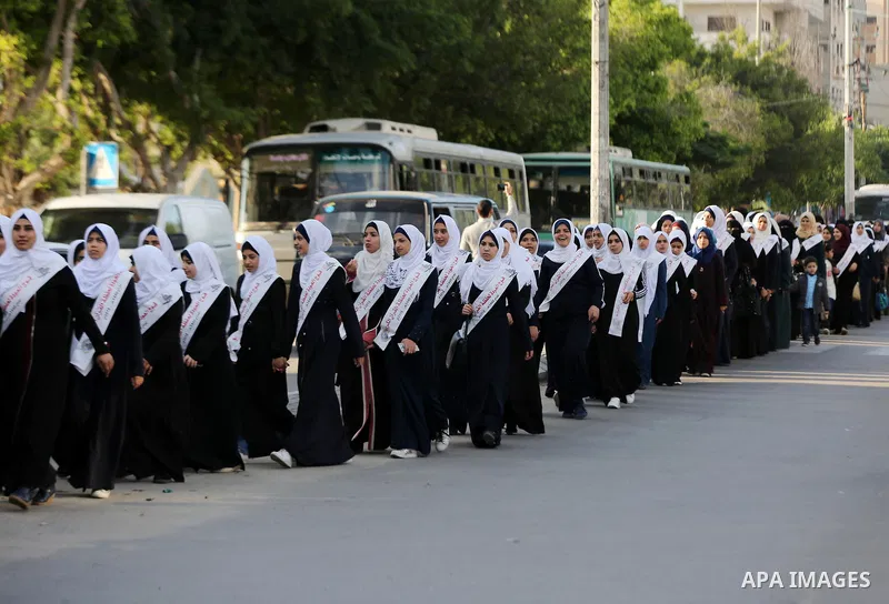 Palestinian females attend a religious ceremony after they completing the Koran education, organized by Islamic Jihad in Gaza City on November 25, 2018. Photo by Ashraf Amra